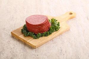 Sliced salami pork sausage snack photo