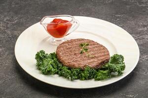 Grilled beef cutlet for burger photo