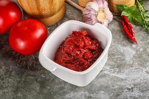 Natural organic red tomato paste photo