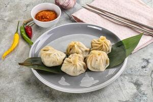 Chinese traditional steamed dumpligs momo photo