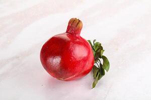 Ripe red sweet and juicy Pomegranate photo