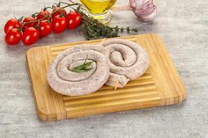 Natural spiral sausage for grill photo