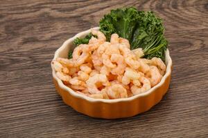 Small unshelled shrimps in the bowl photo
