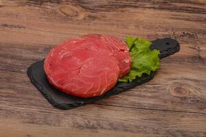 Raw tuna steak for grill photo