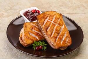 Roasted duck breast with sauce photo