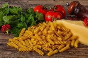 Italian pasta - raw Girandole for cooking photo