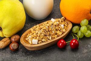 Breakfast with granola and milk photo