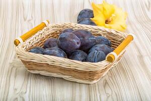 Fresh ripe prunes photo