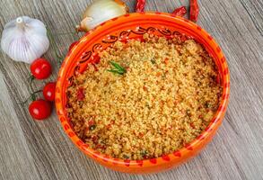 Couscous in the bowl photo