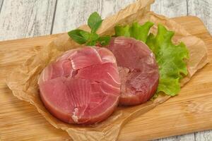 Raw tuna round steak for grill photo