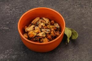 Pickled mussels in the bowl photo