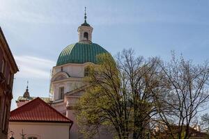 St. Kazimierz Church on New Town Square in Warsaw, Poland photo