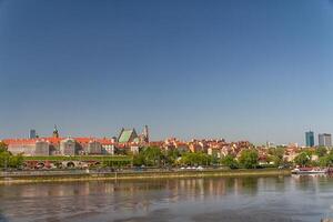 Old Town by the river Vistula picturesque scenery in the city of Warsaw, Poland photo