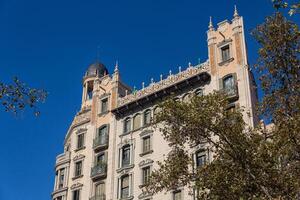 Buildings' facades of great architectural interest in the city of Barcelona - Spain photo