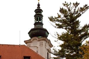 The View on the Prague's gothic Castle and Buildings photo