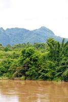 river in jungle, Thailand photo