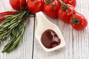 Tomato barbecue sauce on the bowl photo