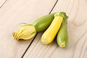 Raw baby organic zucchini heap photo