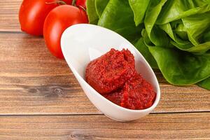Tomato puree sauce for cooking photo