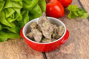 Chicken liver with cream sauce photo