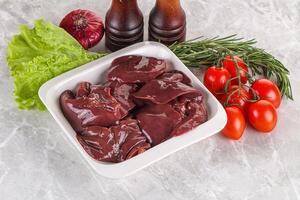 Raw turkey liver in a bowl ready for cooking photo