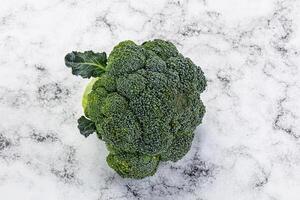 Raw ripe green broccoli cabbage photo