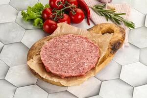 Raw beef uncooked burger cutlet photo