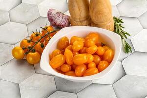 Marinated natural yellow cherry tomato photo