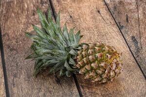 Sweet organic ripe tropical pineapple photo