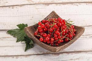 Sweet ripe red currant berries photo