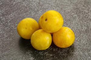 Yellow sweet plum heap fruit photo