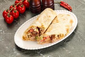 Shawarma with grilled chicken meat photo