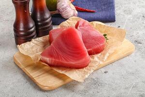 Delicous raw tuna steak for cooking photo