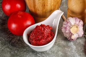 Natural organic red tomato paste photo