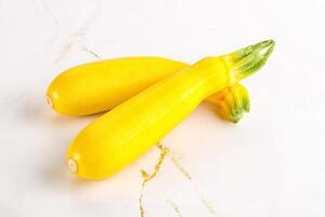 Yellow young zucchini for cooking photo