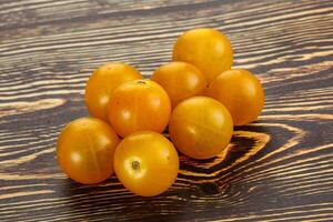 Ripe tasty yellow cherry tomato photo