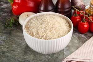 Raw delicous basmati rice heap photo