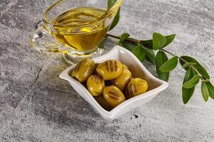 Grilled green olives appetizer snack photo