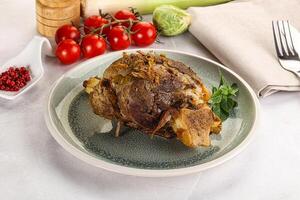 Baked Lamb shank with bone photo