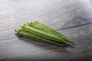 Green ripe tasty okra tropical vegetable photo