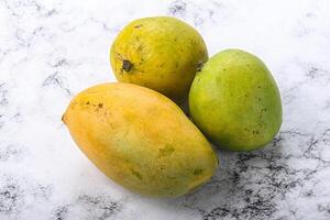 Fresh sweet and juicy mango heap photo