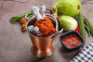 Indian cuisine glazed chicken lollipop photo