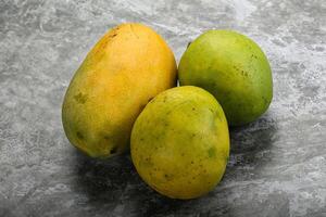 Fresh sweet and juicy mango heap photo