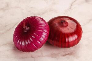 Purple raw onion for cooking photo