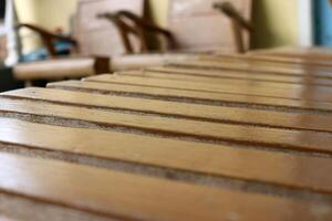 Close up view of vintage wooden chairs photo