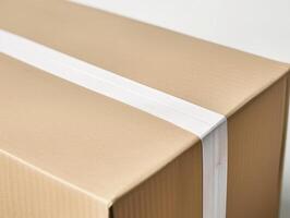 AI generated Close up of kraft box brown cardboard with blank white adhesive tape mockup photo