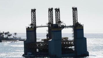 Maritime platform stranded on the coast of a beach video