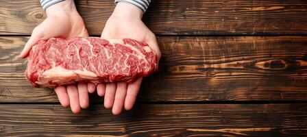 AI generated Freshly cut, juicy raw beef steak held by butcher hands with space for text placement photo