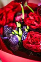 Colorful Flowers in Red Bowl photo