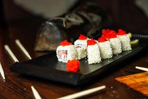 Fresh Sushi Platter on Wooden Table photo